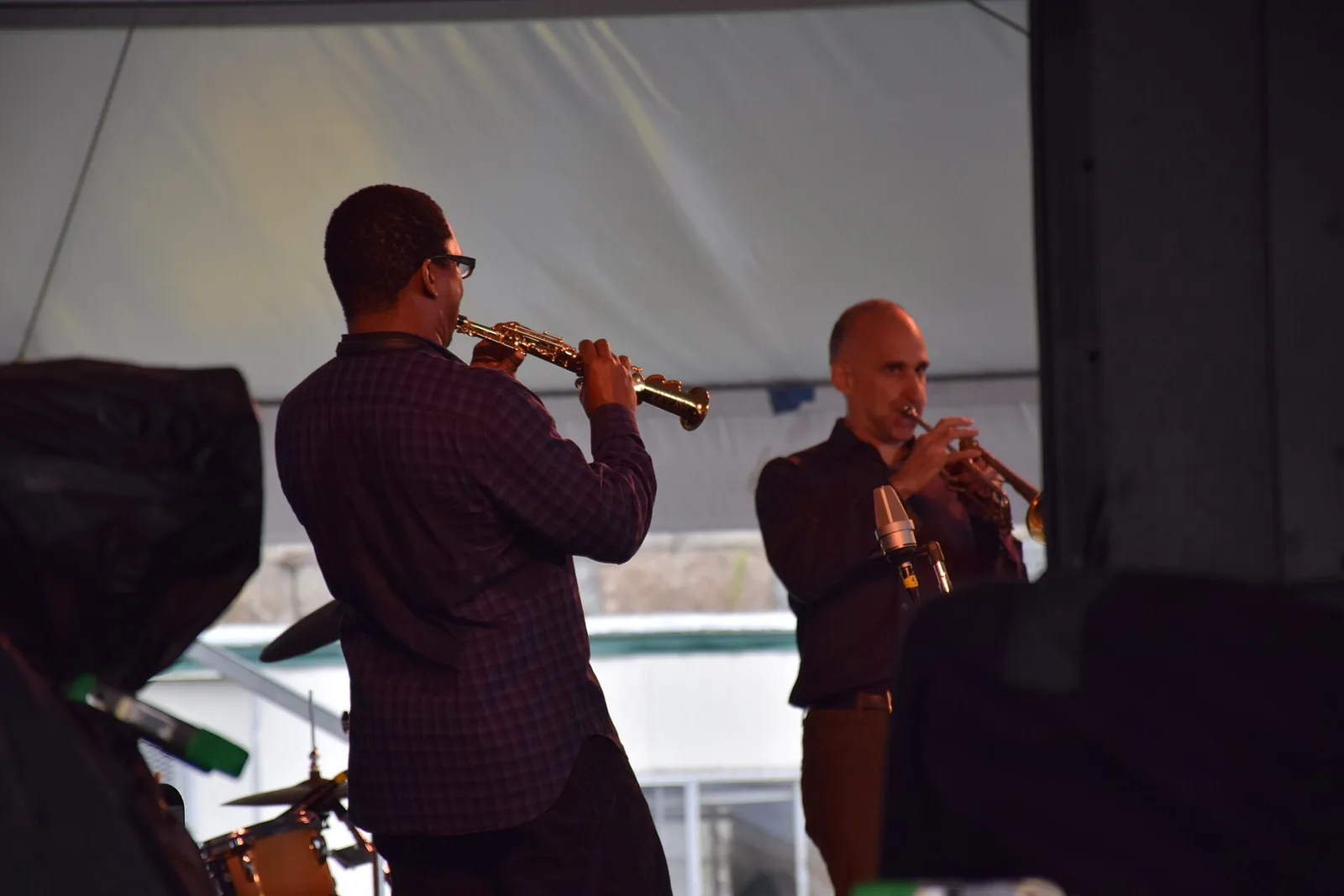 Saxophonist Ravi Coltrane, a headliner at the 2026 John Coltrane festival in High Point, playing soprano sax on an outdoor festival stage in Newport, R.I.