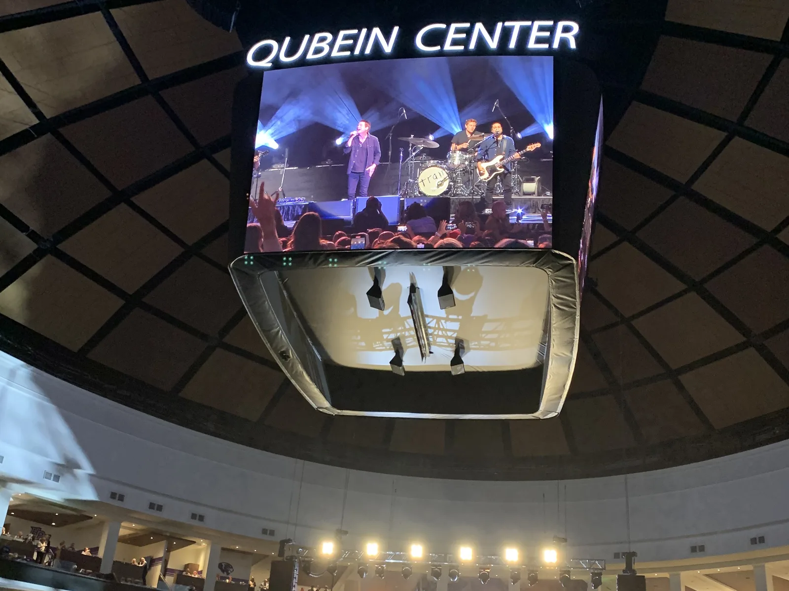 The band Train on the video board during a concert in the Nido and Mariana Qubein Arena at High Point University.