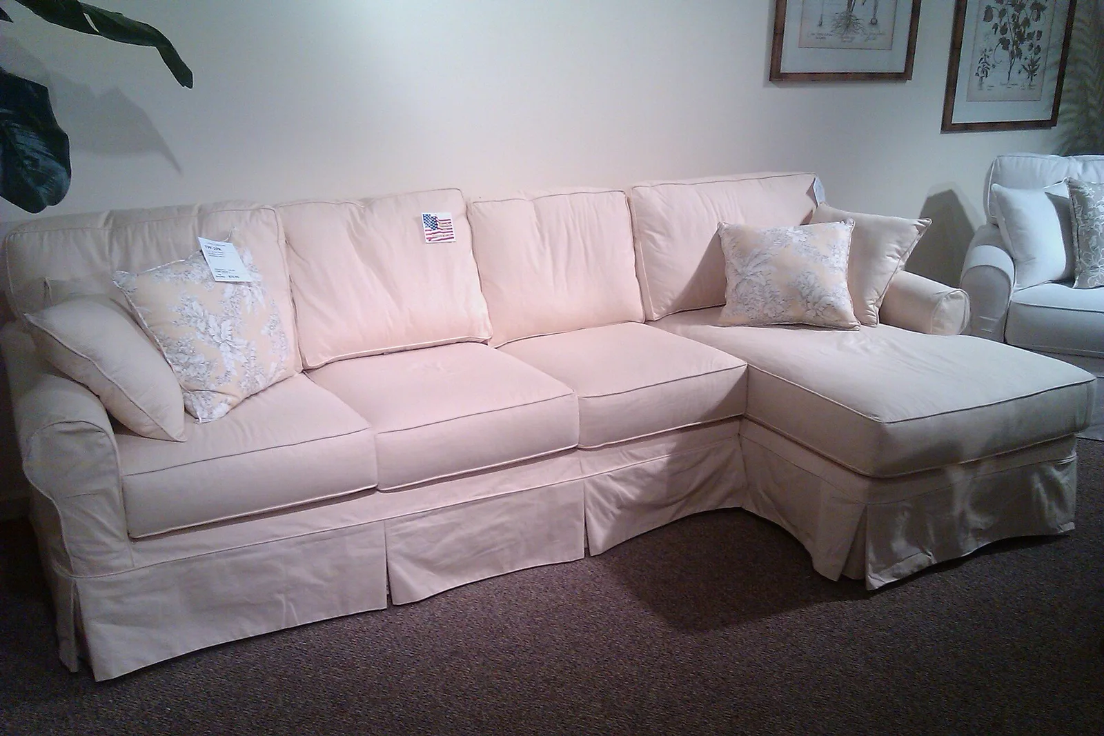 Sofas and armchairs on display in a showroom at High Point Market.