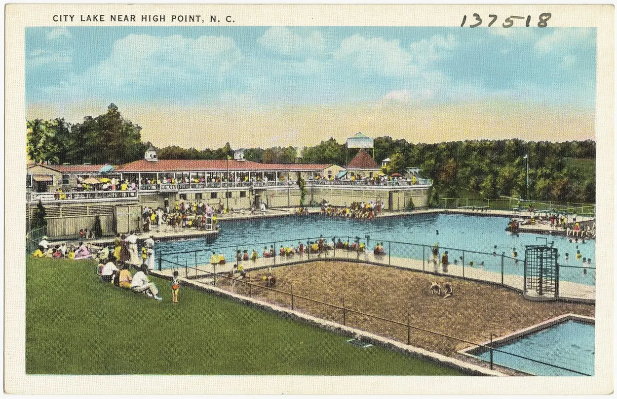 The swimming pool at High Point City Lake on a vintage postcard; City Lake Park still has a pool and waterslide.