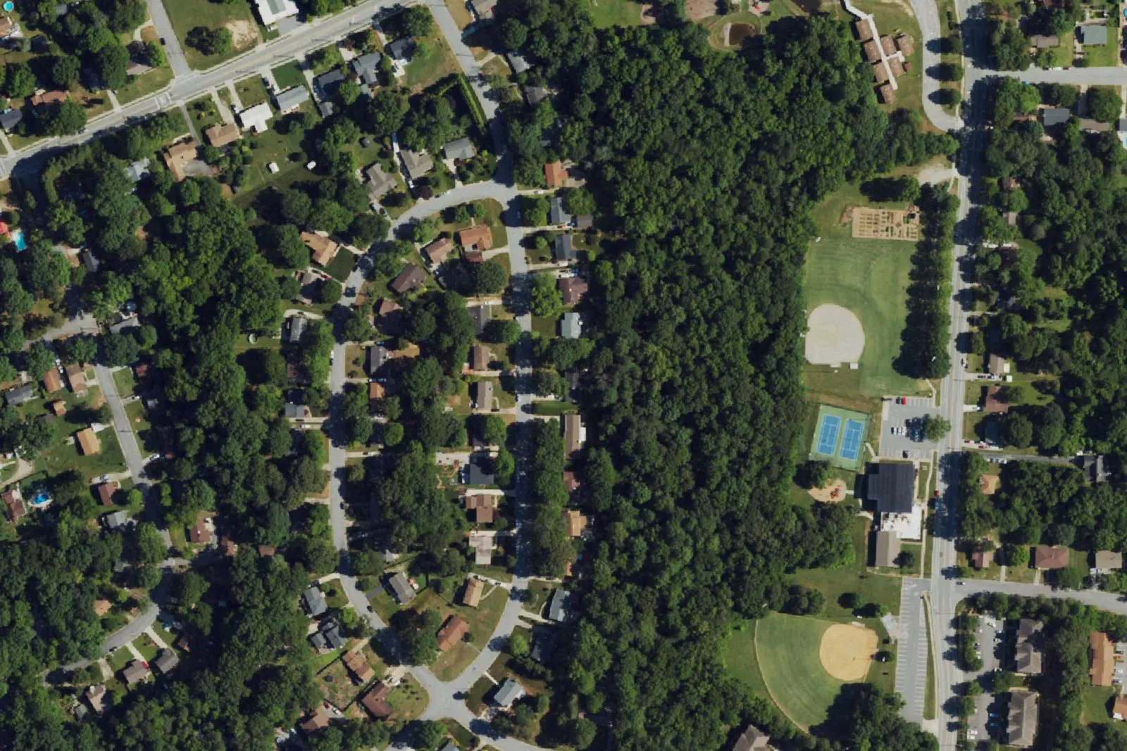 Homes around the Oakview Recreation Center ball fields and tennis courts on James Road in High Point, seen from the air